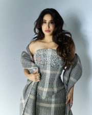 Dazzling Actress Janhvi Kapoor in a Grey plaid strapless midi dress Photos 04