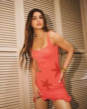 Dazzling Actress Kriti Sanon in a Coral Pink Starfish Mini Dress Photos 01