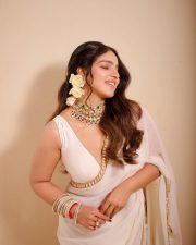Dazzling Actress Malavika Menon in an Off Shoulder Saree with Ornate Necklace Photos 05