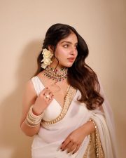 Dazzling Actress Malavika Menon in an Off Shoulder Saree with Ornate Necklace Photos 07