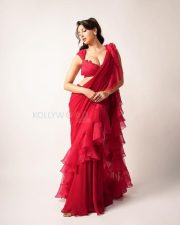Dazzling Actress Nora Fatehi in a Ruffled Saree Photos 01