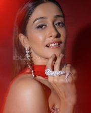 Dazzling Actress Regina Cassandra in a Red Satin Strapless Embellished Gown Photos 02