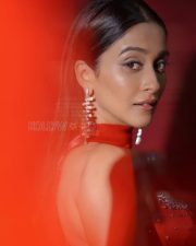 Dazzling Actress Regina Cassandra in a Red Satin Strapless Embellished Gown Photos 04