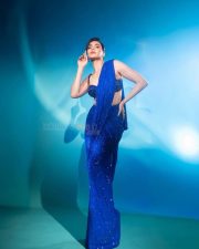 Dazzling Karishma Tanna in a Royal Blue Sequin Shimmery Saree with a Sleeveless Blouse Photos 01