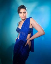 Dazzling Karishma Tanna in a Royal Blue Sequin Shimmery Saree with a Sleeveless Blouse Photos 03