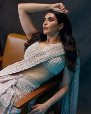Dazzling Karishma Tanna in a Stunning Ash Pink Chandelier Pearl Drop Saree with an Sleeveless Blouse Photos 03