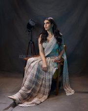 Dazzling Karishma Tanna in a Stunning Ash Pink Chandelier Pearl Drop Saree with an Sleeveless Blouse Photos 04