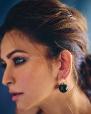 Dazzling Kriti Kharbanda in a Blue Fish Cut Out Dress with a Black Bralette Photos 04