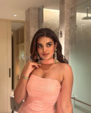 Dazzling Nidhhi Agerwal in an Off Shoulder Pink Bodycon Pictures 05