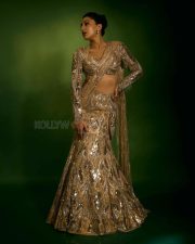 Dazzling Sara Ali Khan in a Manish Malhotra Oyster Gold and Silver Embroidered Lehenga Set Photos 01