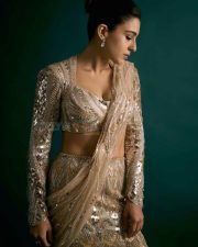 Dazzling Sara Ali Khan in a Manish Malhotra Oyster Gold and Silver Embroidered Lehenga Set Photos 02