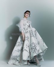 Dazzling Tamannaah Bhatia in a Stunning White Gown with Black Floral Illustrations Photos 08