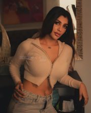 Dazzling Yashika Aannand Navel in a Ribbed Zipper Crop Top and Denim Pant Photos 02