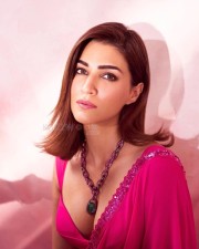 Desi Beauty Kriti Sanon in a Pink Saree with Matching Sleeveless Pink Bralette showing Cleavage Pictures 04
