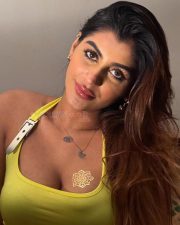 Devils Double Next Level Actress Yashika Aannand in a Lime Green Halter Neck Top Pictures 03