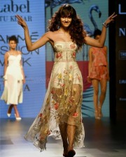 Mumbai: Bollywood actress Disha Patani walks the ramp during Lakme Fashion Week displaying Ritu Kumar's collection in Mumbai on Wednesday. PTI Photo by Mitesh Bhuvad(PTI8_16_2017_000043B) Disha Patani Rampwalk Photos