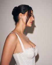 Dream Girl Disha Patani in a White Figure Hugging Lace Dress with Cleavage Photos 03