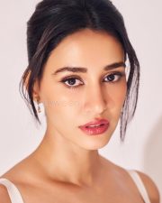 Dream Girl Disha Patani in a White Figure Hugging Lace Dress with Cleavage Photos 10