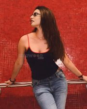 Edgy Actress Priya Prakash Varrier in a Black Spaghetti Strap Cami Top With Red Trim And Blue Jeans Photos 01 Edgy Actress Priya Prakash Varrier in a Black Spaghetti Strap Cami Top With Red Trim And Blue Jeans Photos 01