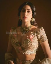 Elegant Actress Janhvi Kapoor in an Ivory Floral Lehenga Photos 04