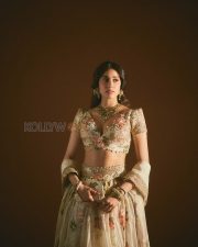 Elegant Actress Janhvi Kapoor in an Ivory Floral Lehenga Photos 06