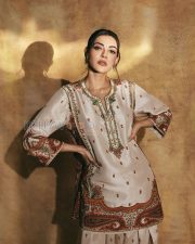 Elegant Actress Kajal Aggarwal in a Ivory Embroidered Ethnic Kurti Photos 02