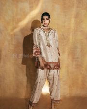 Elegant Actress Kajal Aggarwal in a Ivory Embroidered Ethnic Kurti Photos 03