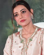 Elegant Actress Kajal Aggarwal in a White Embroidered Salwar Kameez Photos 01
