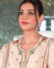 Elegant Actress Kajal Aggarwal in a White Embroidered Salwar Kameez Photos 04