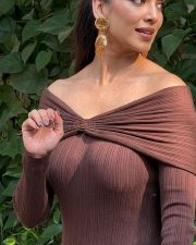 Elegant Actress Malavika Mohanan in a Brown Off Shoulder Ribbed Dress Photos 03