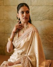 Elegant Actress Malavika Mohanan in a Gold Embroidered Saree Photos 01