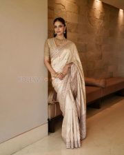 Elegant Actress Malavika Mohanan in a Gold Embroidered Saree Photos 03