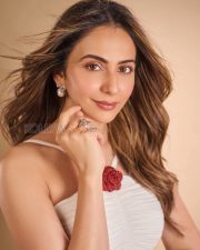 Elegant Actress Rakul Preet Singh in a White ruched halter gown with red rose Photos 04 Elegant Actress Rakul Preet Singh in a White ruched halter gown with red rose Photos 04
