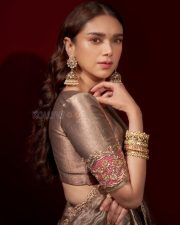 Elegant Aditi Rao Hydari in a Silver Lehenga with heavy jhumkis Photos 04