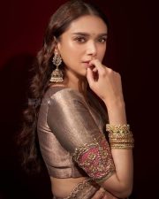 Elegant Aditi Rao Hydari in a Silver Lehenga with heavy jhumkis Photos 05