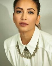 Elegant Kriti Kharbanda in a White Dress Photo 01