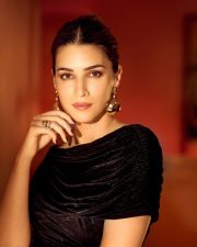 Elegant Kriti Sanon in a Sleek Black Dress with a Thigh Slit Pictures 02