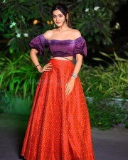 Elegant Payal Rajput in a Purple Off Shoulder Crop Top and Red Lehenga Photos 02