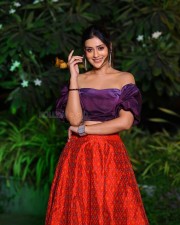 Elegant Payal Rajput in a Purple Off Shoulder Crop Top and Red Lehenga Photos 04