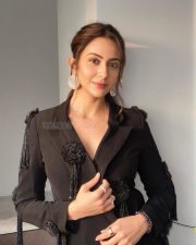 Elegant Rakul Preet Singh in a Black Long Sleeved Top with a Sheer Black Maxi Skirt Pictures 01
