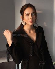 Elegant Rakul Preet Singh in a Black Long Sleeved Top with a Sheer Black Maxi Skirt Pictures 03