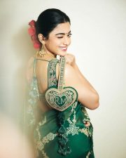 Elegant Rashmika Mandanna in an Emerald Green Saree with Sleeveless Blouse and Heart Shaped Bag Photos 06 Elegant Rashmika Mandanna in an Emerald Green Saree with Sleeveless Blouse and Heart Shaped Bag Photos 06