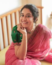 Elegant Regina Cassandra at Mookuthi Amman 2 Pooja Event in a Pink Chanderi Tissue Saree with a Green Blouse Photos 05