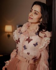 Elegant Trisha Krishnan in a Pastel Pink Outfit with Butterflies and Ruffled Sleeves Photos 01