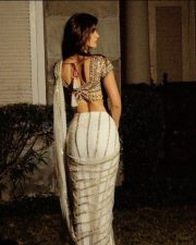 Enchanting Actress Disha Patani in a Cream Saree Photos 07