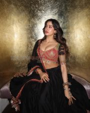 Enchanting Actress Janhvi Kapoor in a Pink Embroidered Blouse and Black Lehenga Photos 02