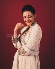 Enchanting Actress Kajal Aggarwal in a White Floral Embroidered Anarkali Suit Photos 03