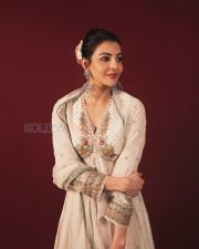 Enchanting Actress Kajal Aggarwal in a White Floral Embroidered Anarkali Suit Photos 04