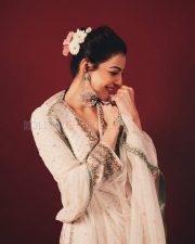 Enchanting Actress Kajal Aggarwal in a White Floral Embroidered Anarkali Suit Photos 06