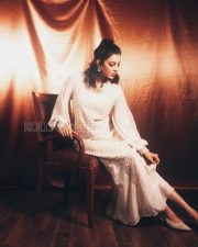 Enchanting Actress Kajal Aggarwal in a White Textured Long sleeve Dress Photos 01